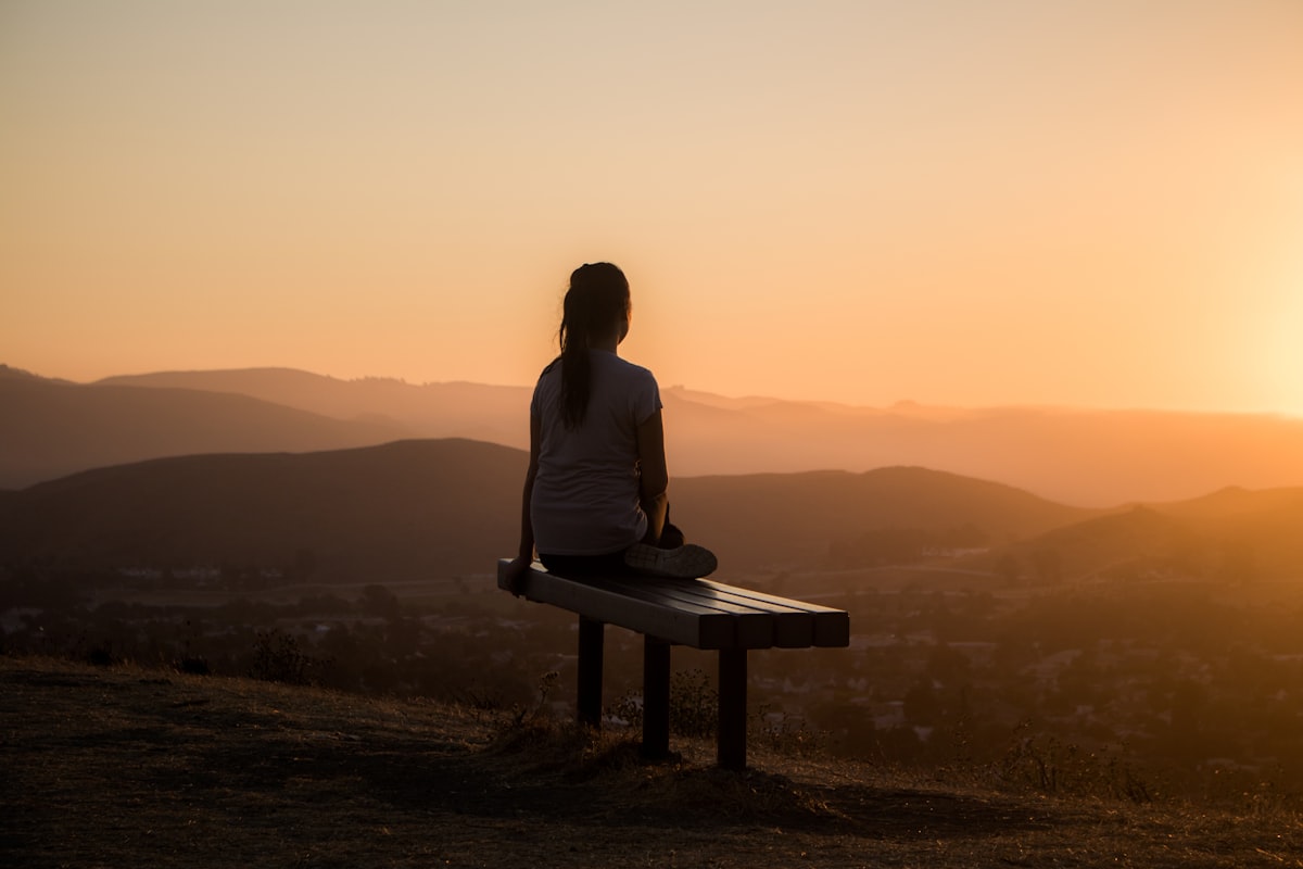A peaceful moment of reflection overlooking the mountains